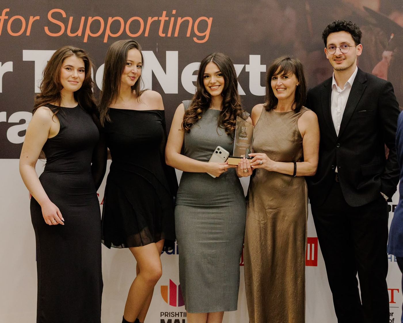 The Digisize team with an award at an RIT Kosovo event